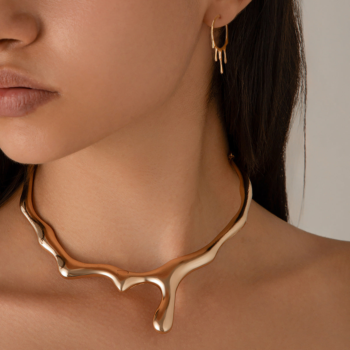 Molten Necklace: A Bold Statement in Liquid Metal