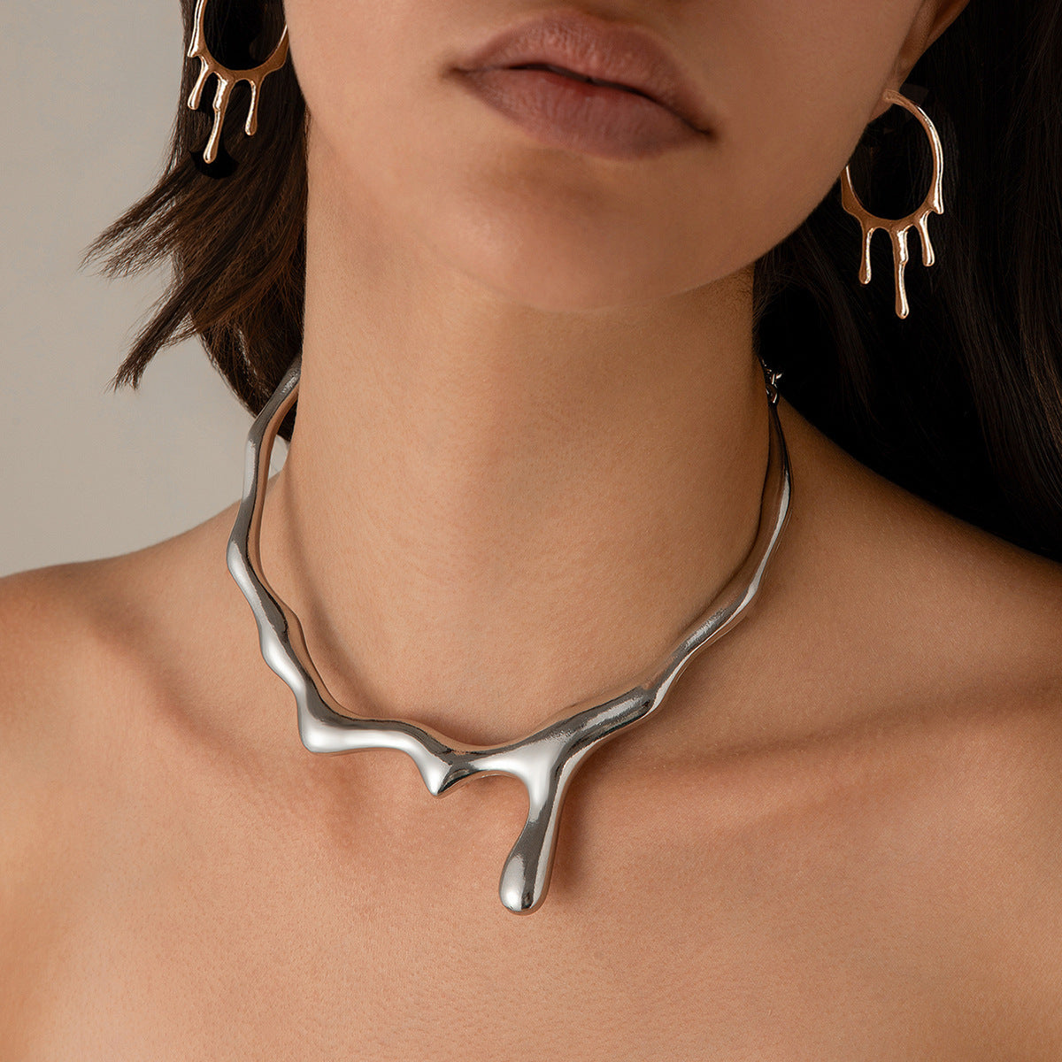 Molten Necklace: A Bold Statement in Liquid Metal