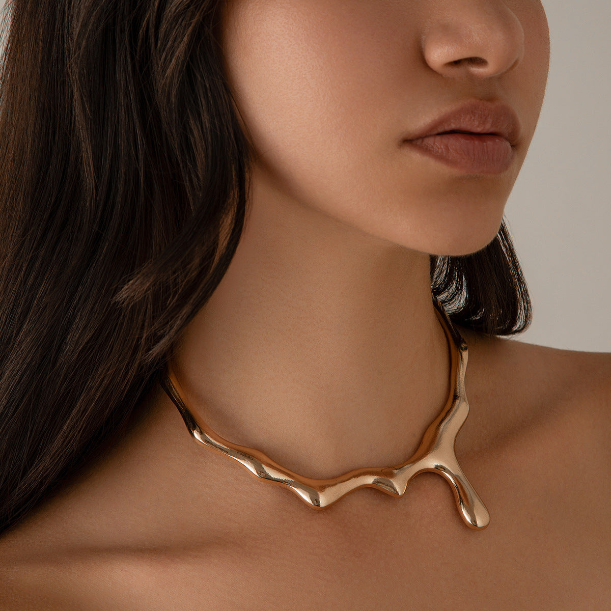 Molten Necklace: A Bold Statement in Liquid Metal