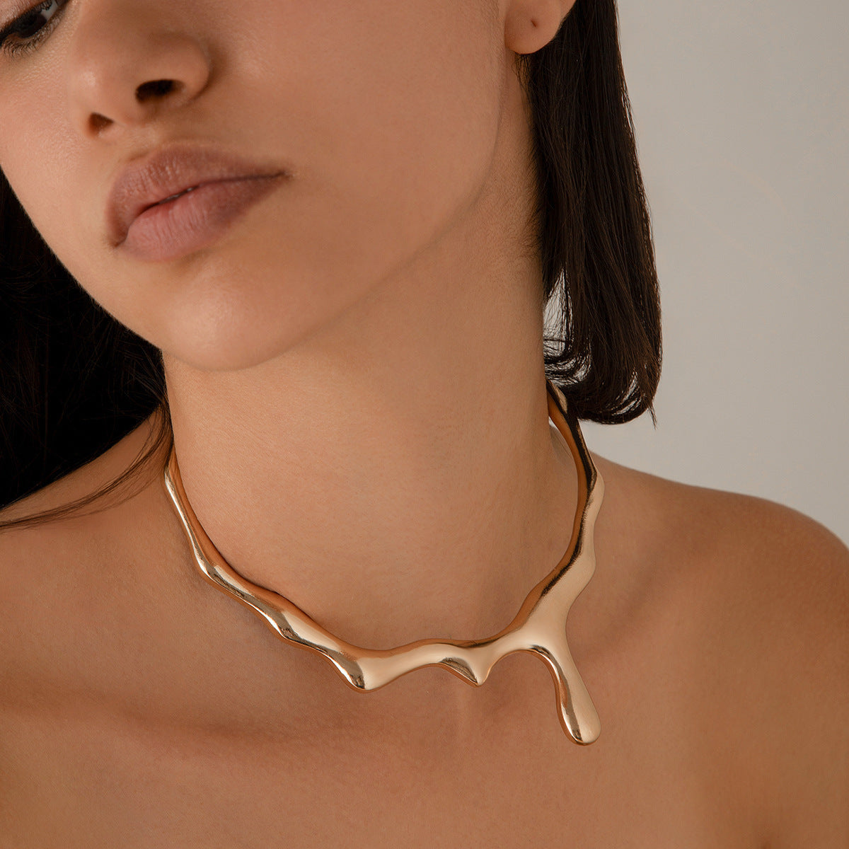 Molten Necklace: A Bold Statement in Liquid Metal