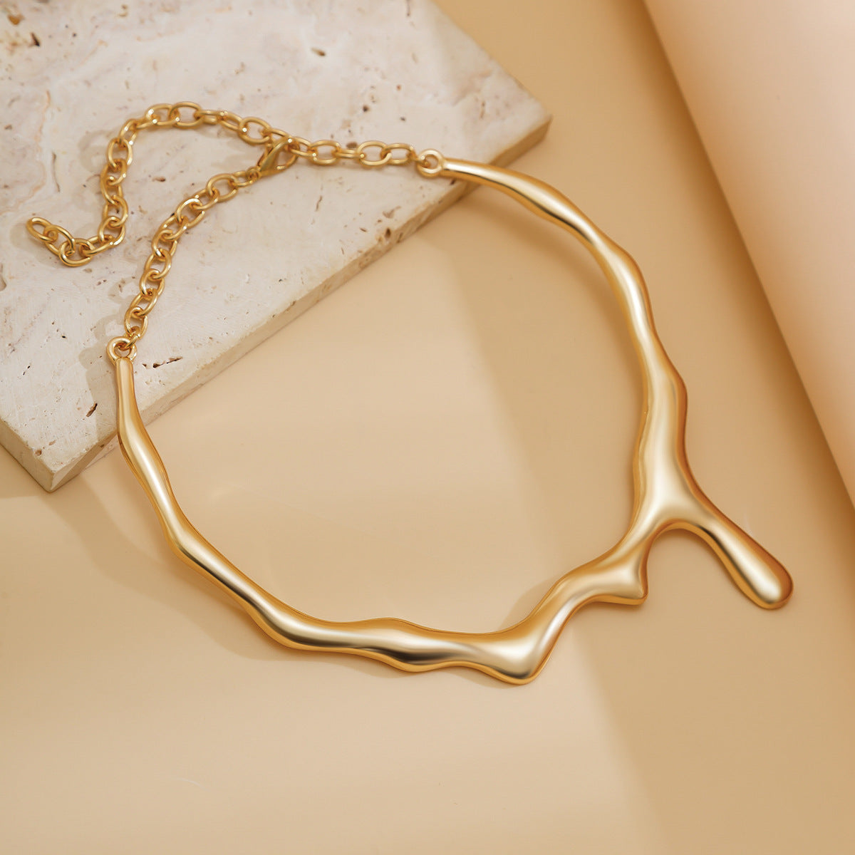 Molten Necklace: A Bold Statement in Liquid Metal